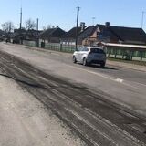 На улице Рокоссовского началось сплошное асфальтирование дороги